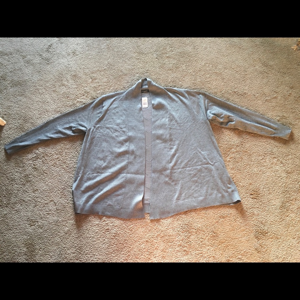 Brand new grey sweater never worn. Tags still on